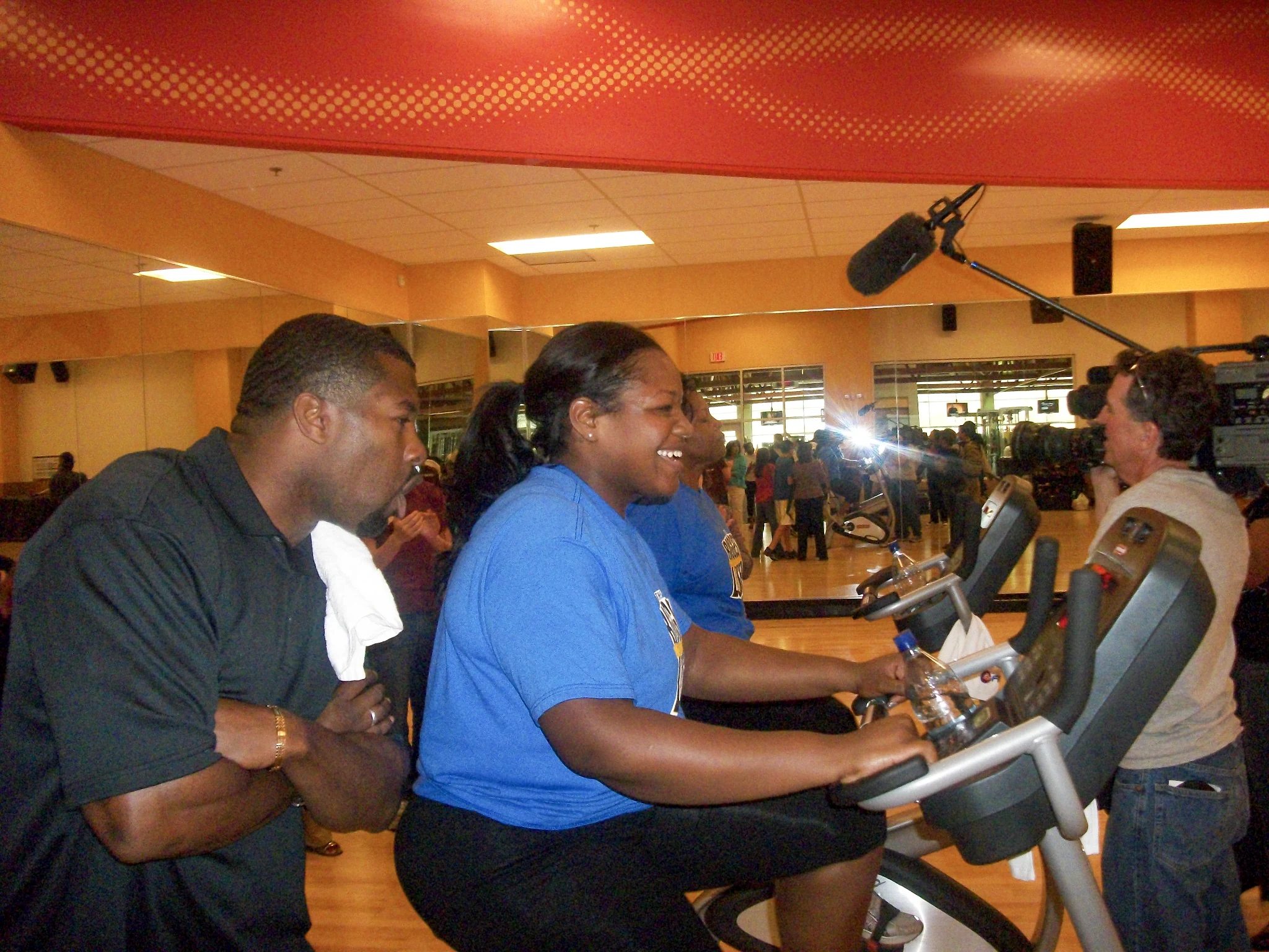 Coach Cal coaching a Biggest Loser contestant during a filmed training session
